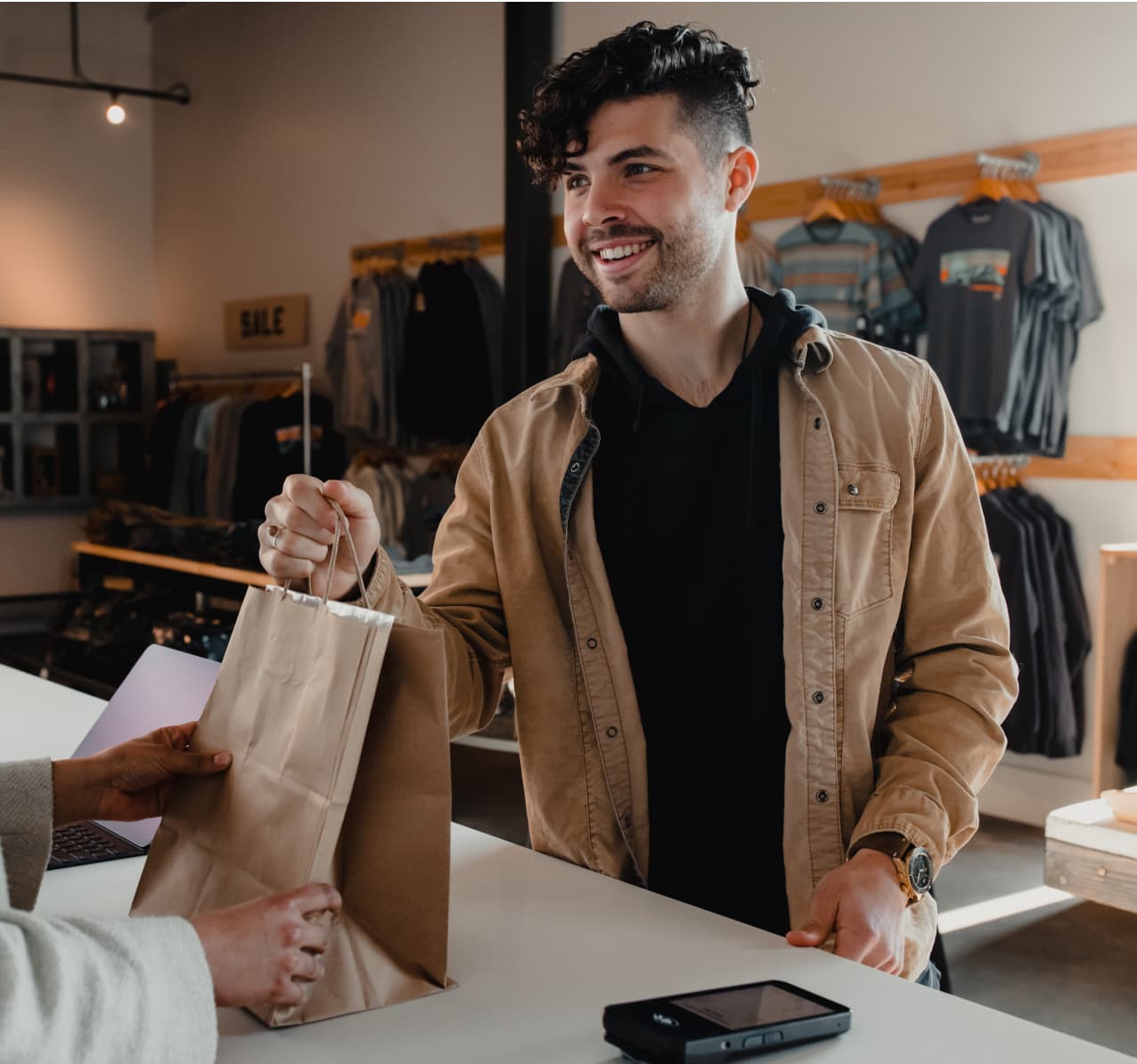 Man leaving store after purchase